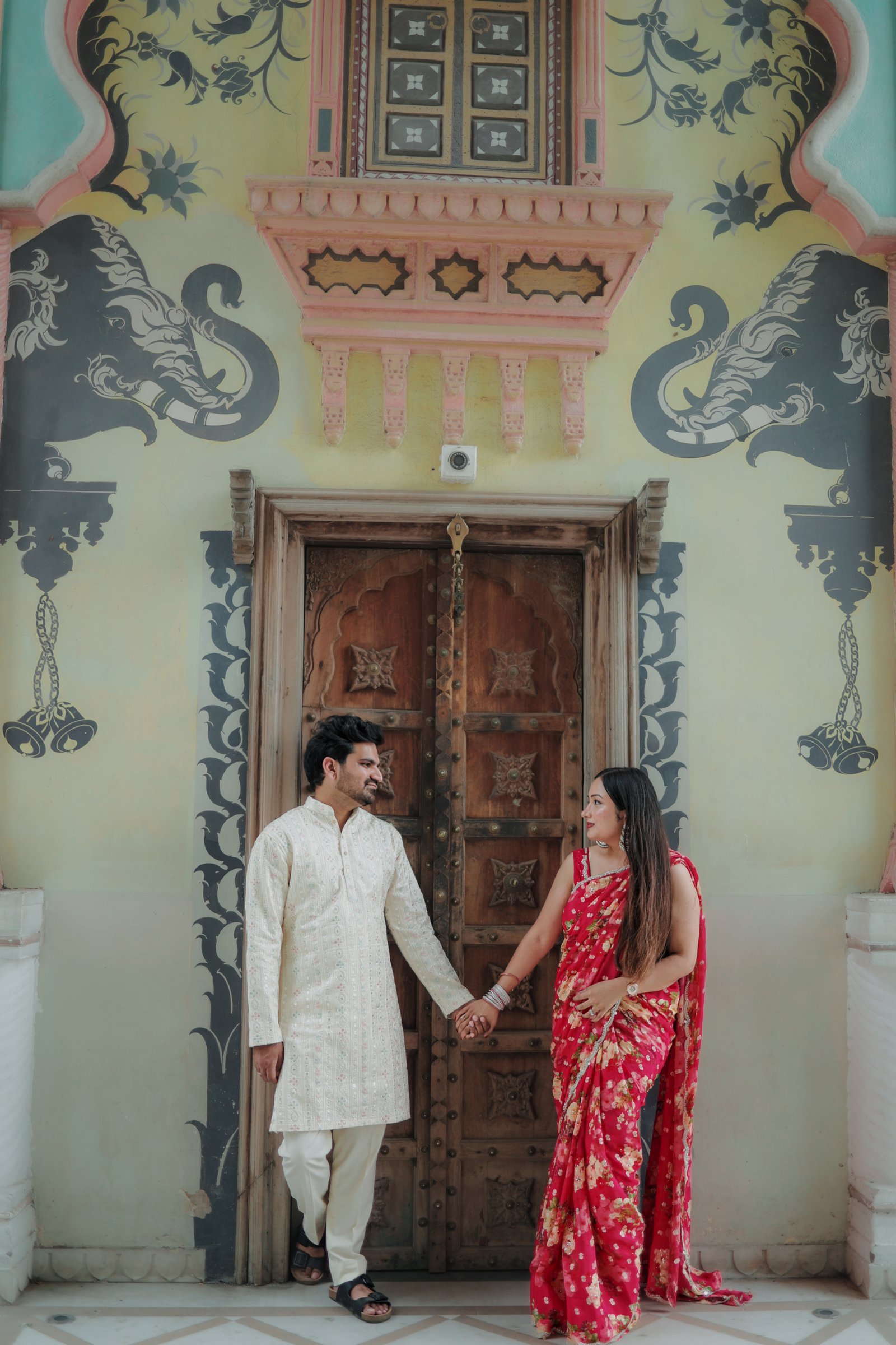 Couple portrait amidst floral decor
