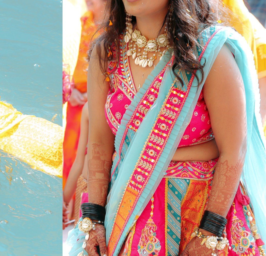 Bride laughing at haldi ceremony
